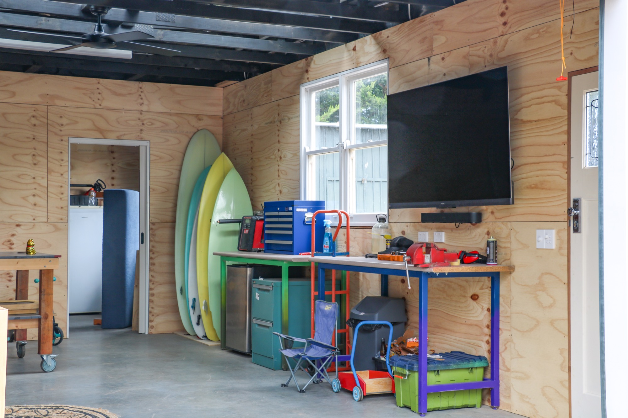 Halifax Street garage build, lined interior with workbench