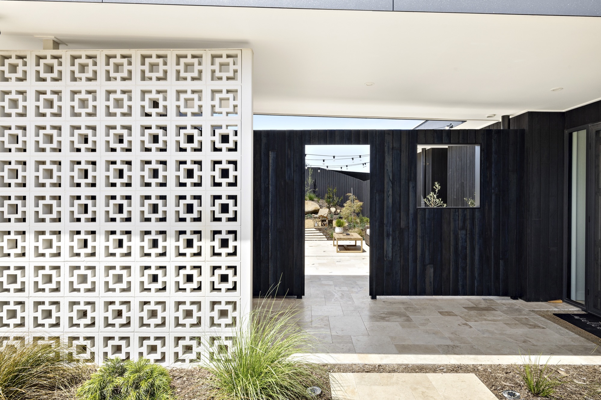Waterfall Gully Road at night, breeze-block entry glowing